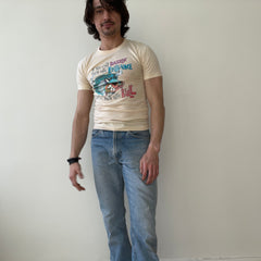 1970s If You Can Dazzle Them w Brilliance, Baffle Them w Bull Stained T-shirt That's Too Small for Cameron