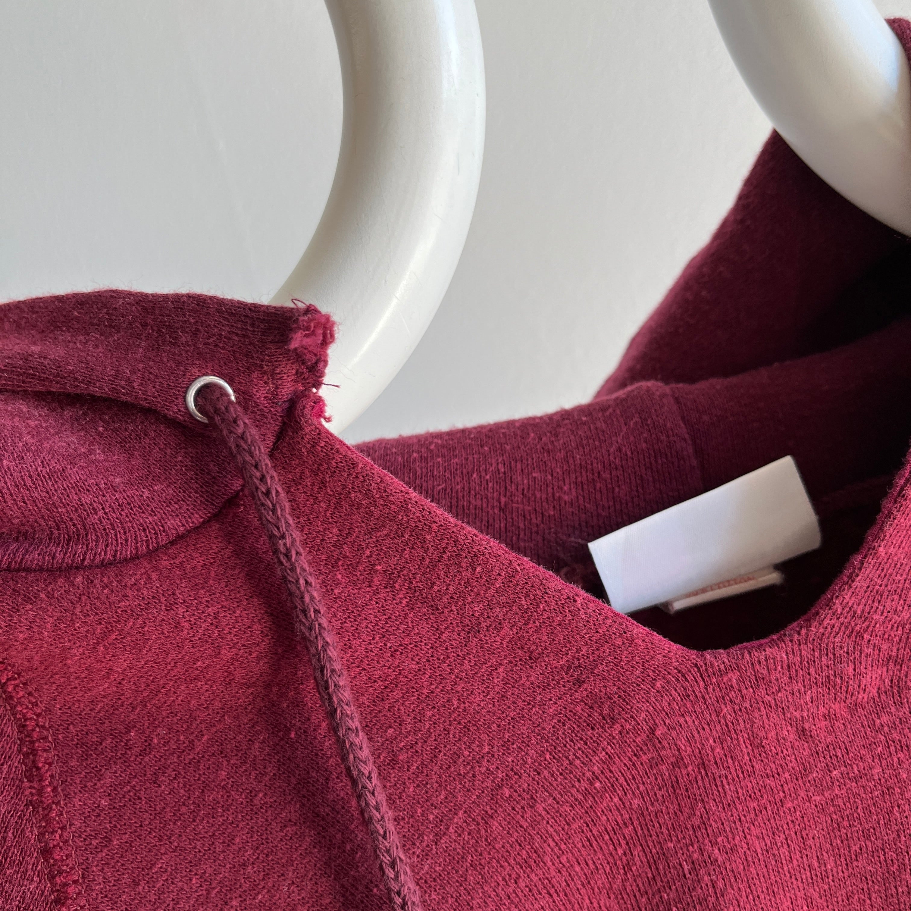 1980s DIY Hemmed Cut Neck on a Burgundy Hoodie by Bassett Walker