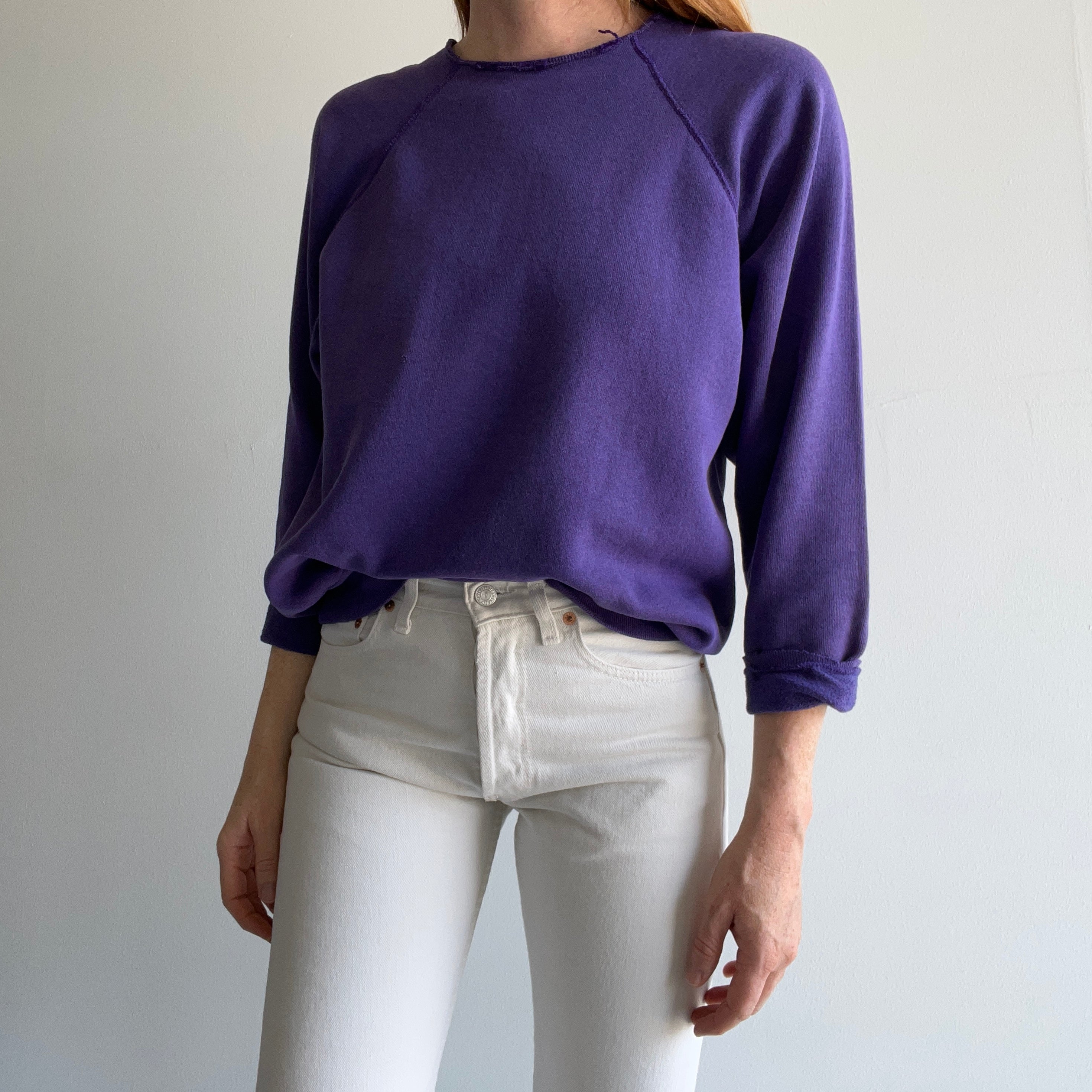 1980s Cut Collar and Cuffs Faded and Worn Purple Raglan Sweatshirt