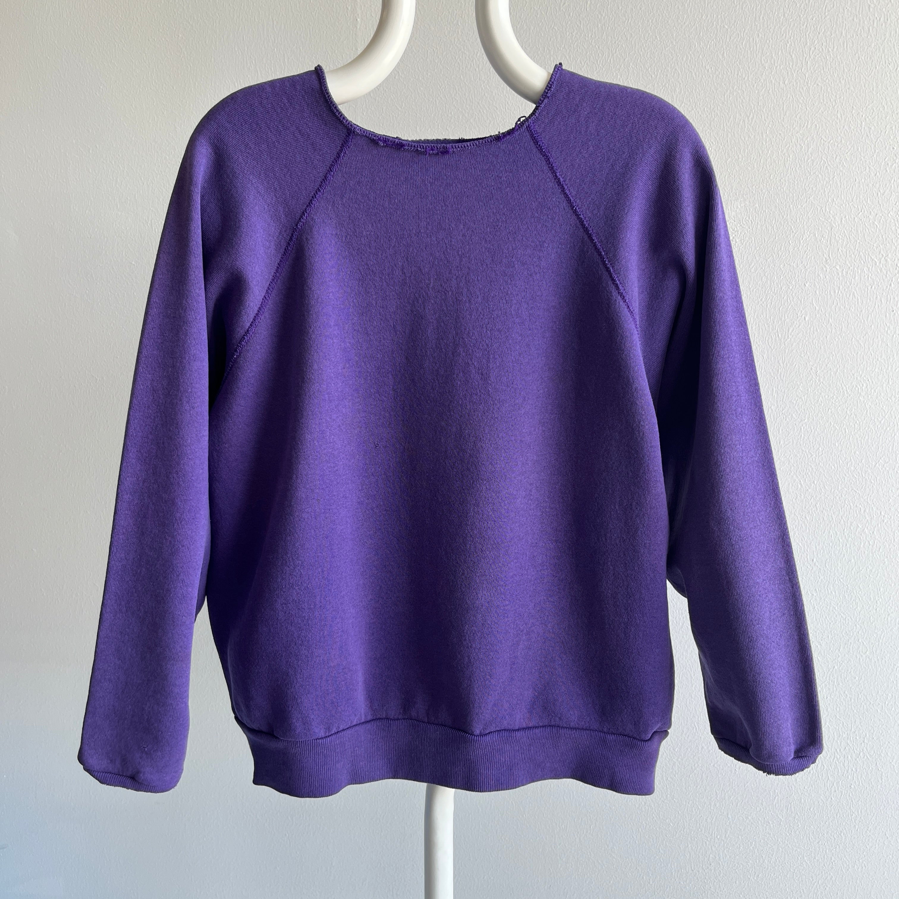 1980s Cut Collar and Cuffs Faded and Worn Purple Raglan Sweatshirt