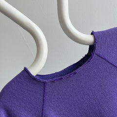 1980s Cut Collar and Cuffs Faded and Worn Purple Raglan Sweatshirt