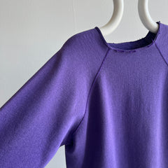 1980s Cut Collar and Cuffs Faded and Worn Purple Raglan Sweatshirt