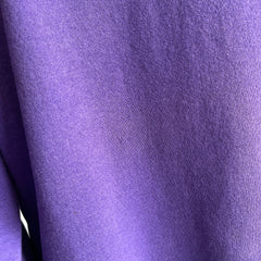 1980s Cut Collar and Cuffs Faded and Worn Purple Raglan Sweatshirt