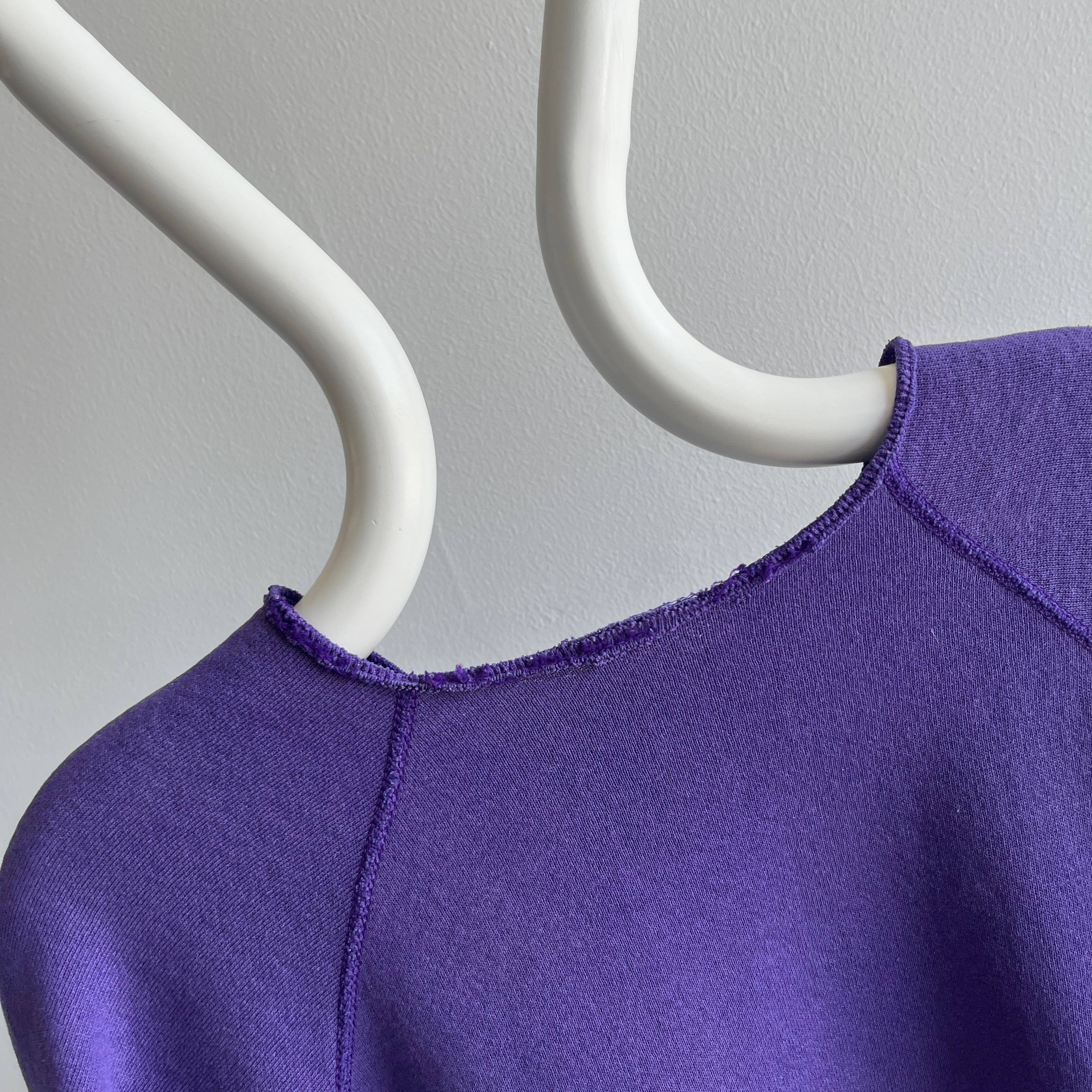 1980s Cut Collar and Cuffs Faded and Worn Purple Raglan Sweatshirt