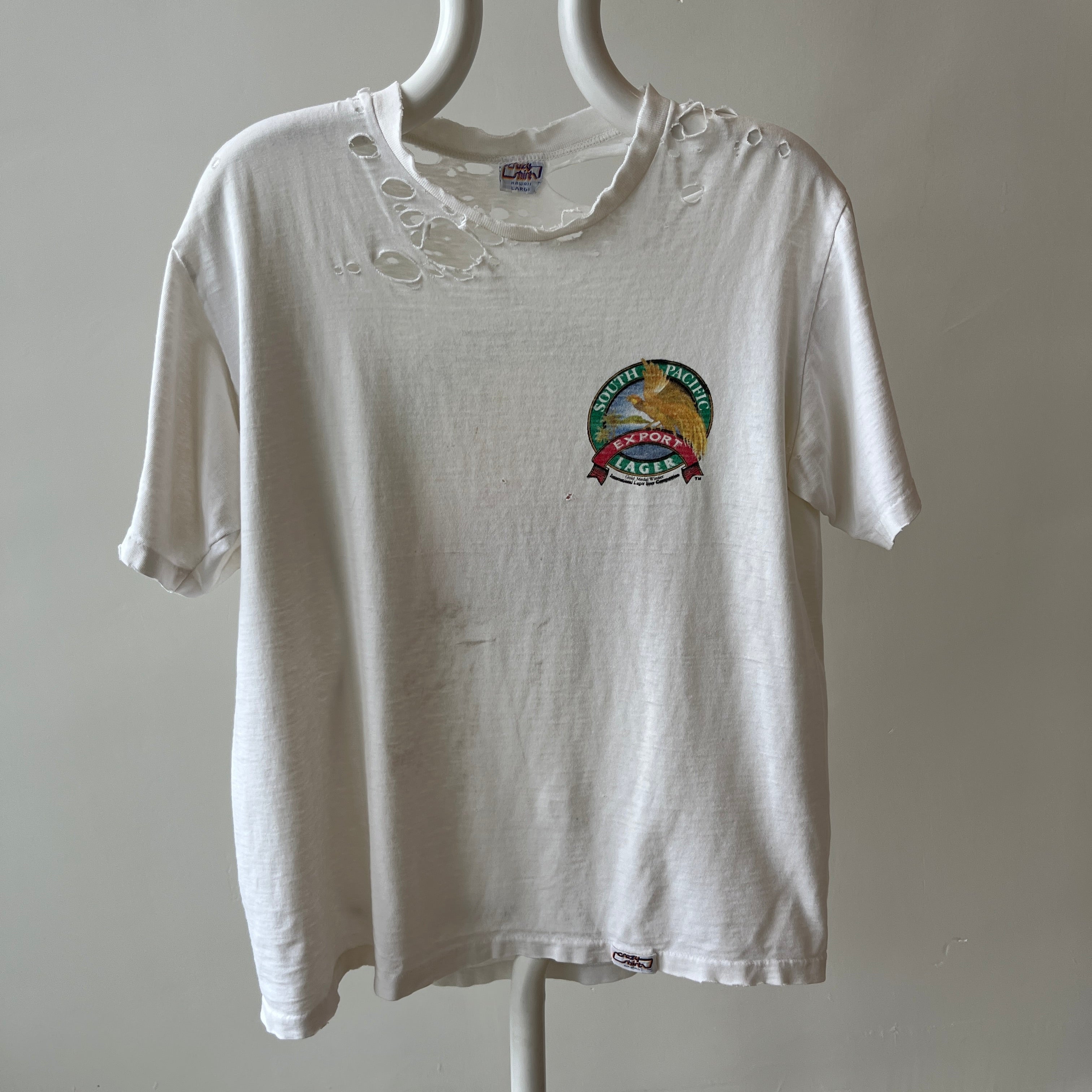 1980s Crazy Shirt - South Pacific Lager - Beer of Paradise - UTTERLY Tattered and Torn Front and Back T-Shirt