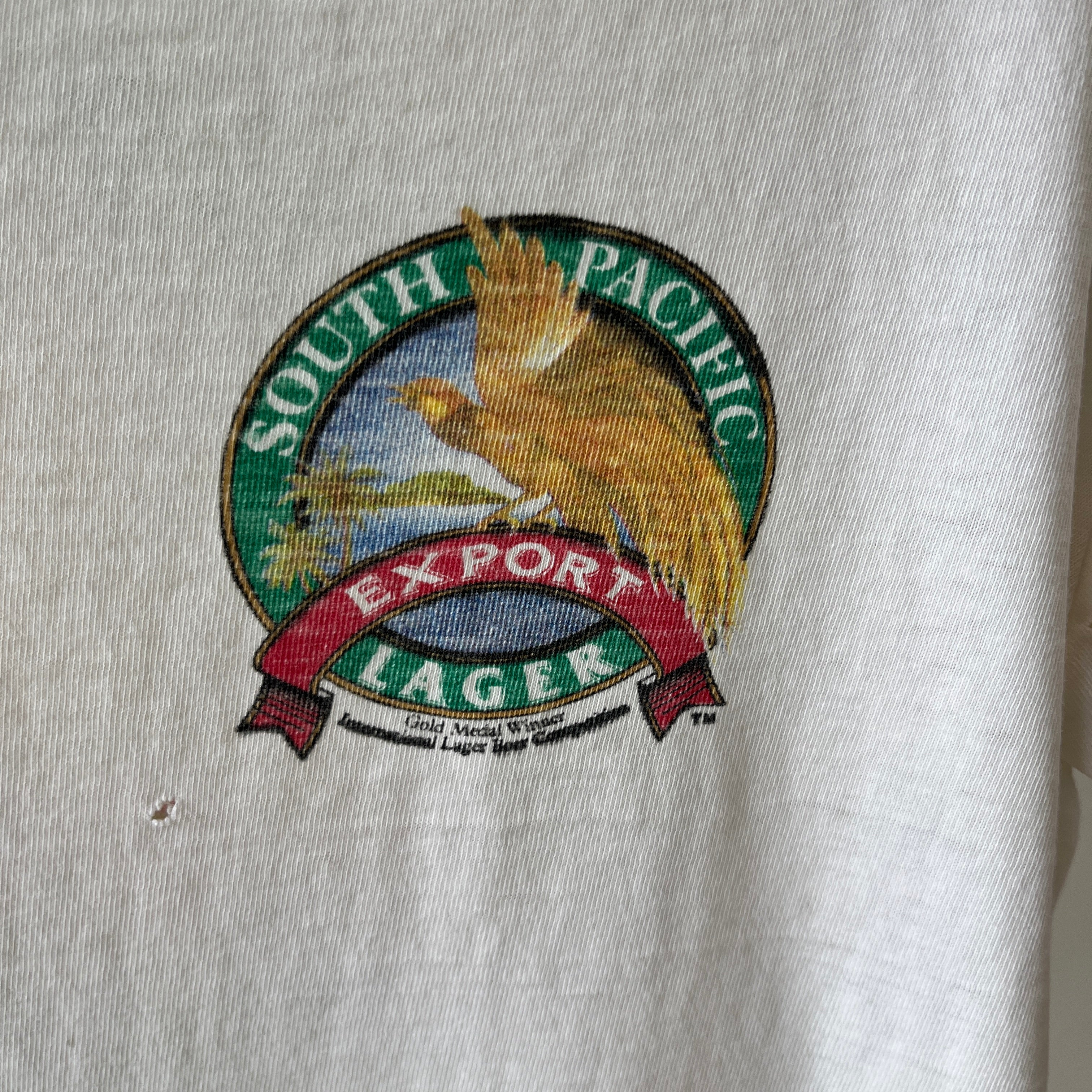 1980s Crazy Shirt - South Pacific Lager - Beer of Paradise - UTTERLY Tattered and Torn Front and Back T-Shirt