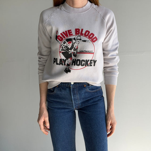 1980s Beyond Stained "Give Blood" Hockey Sweatshirt - Next. Level.