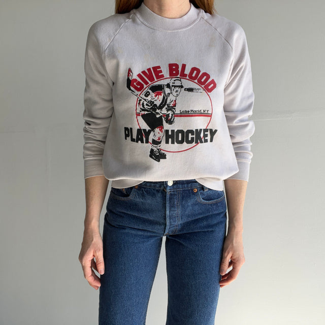 1980s Beyond Stained "Give Blood" Hockey Sweatshirt - Next. Level.