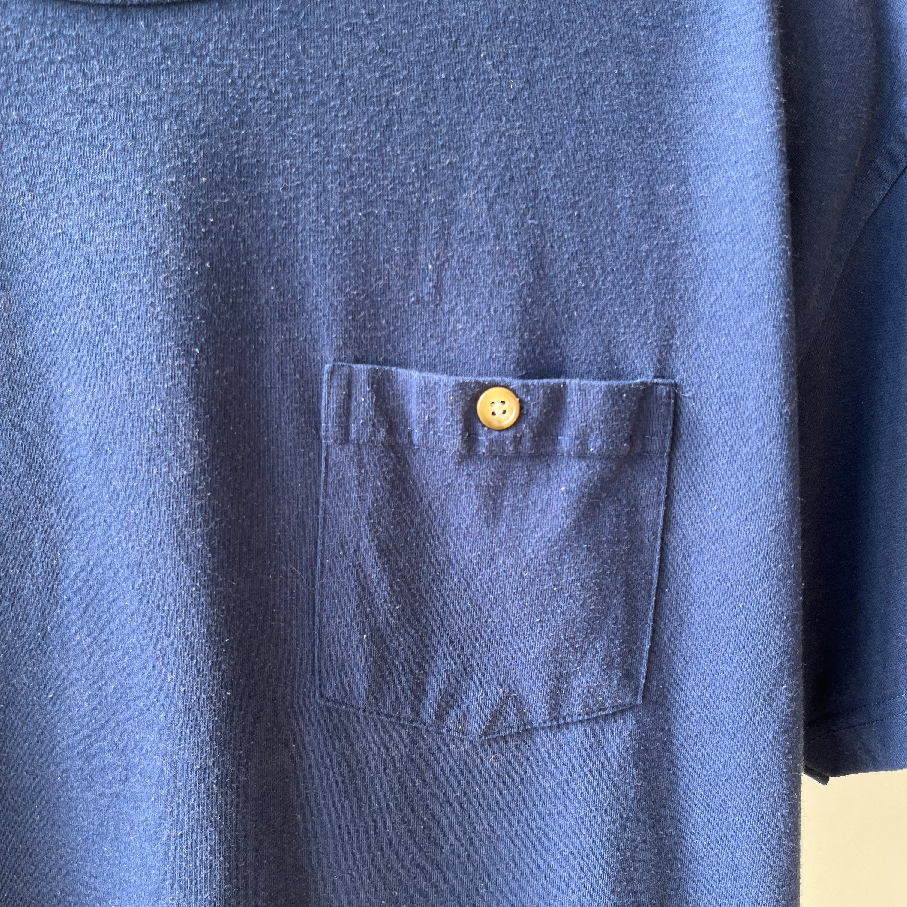 1980s Blank Navy Blue Pocket T Shirt - with a single perfect button