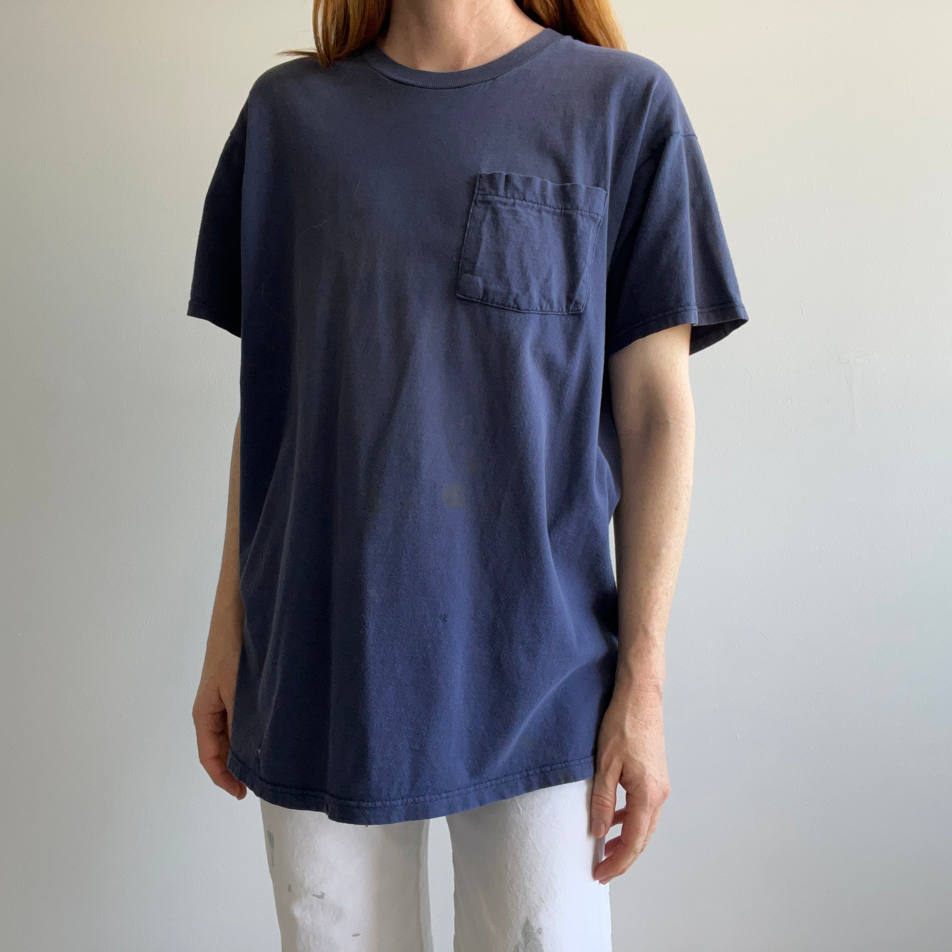 1980s Faded Navy Cotton T-Shirt with Some Graphic Fade on the Backside