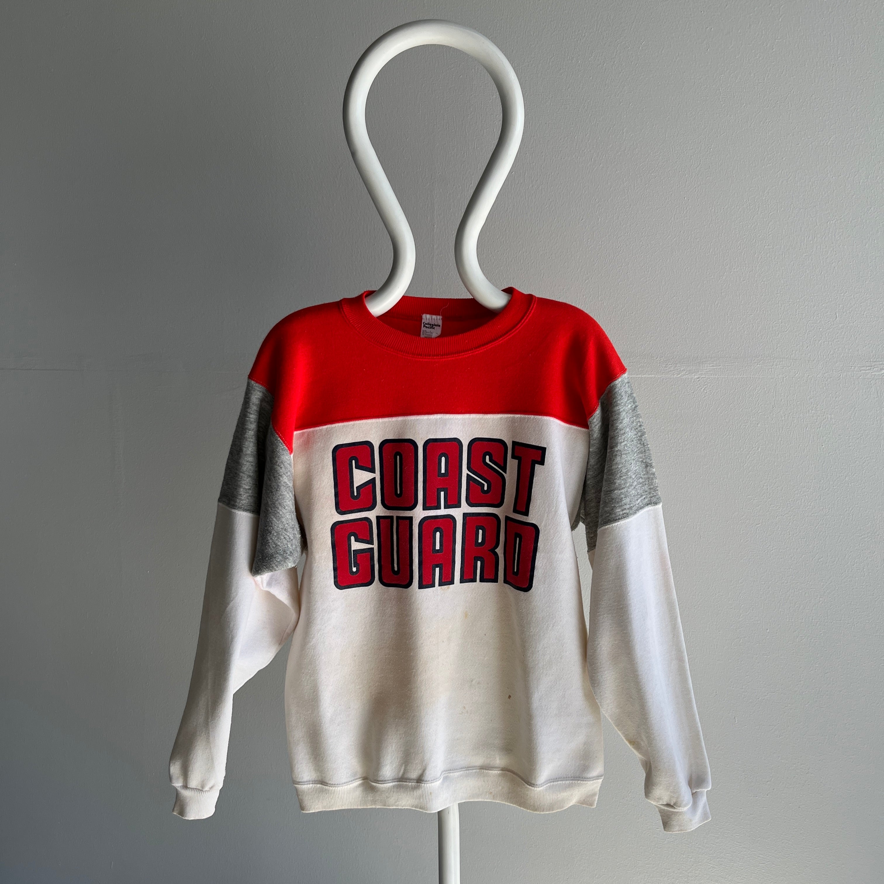 1980s Age Stained Coast Guard on a Collegiate Pacific Color Block Sweatshirt