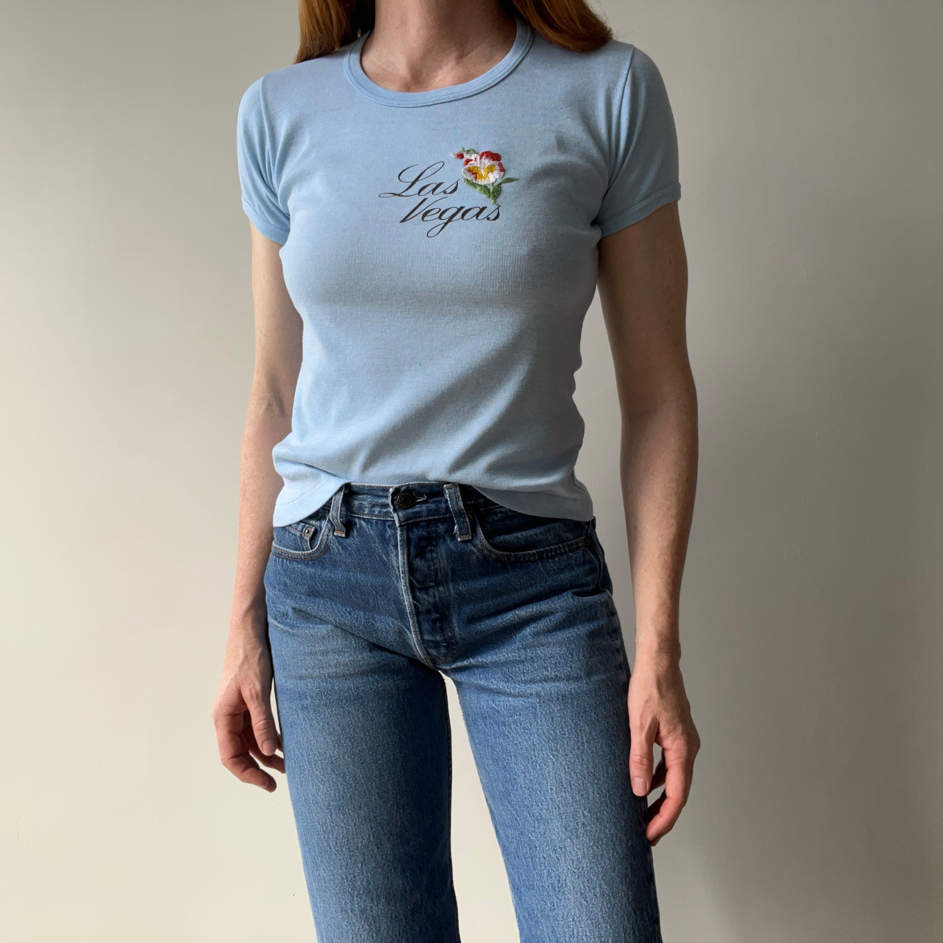 1970s Las Vegas Baby Tee with Embroidered Flower Patch and Faint Arm Pit Stains