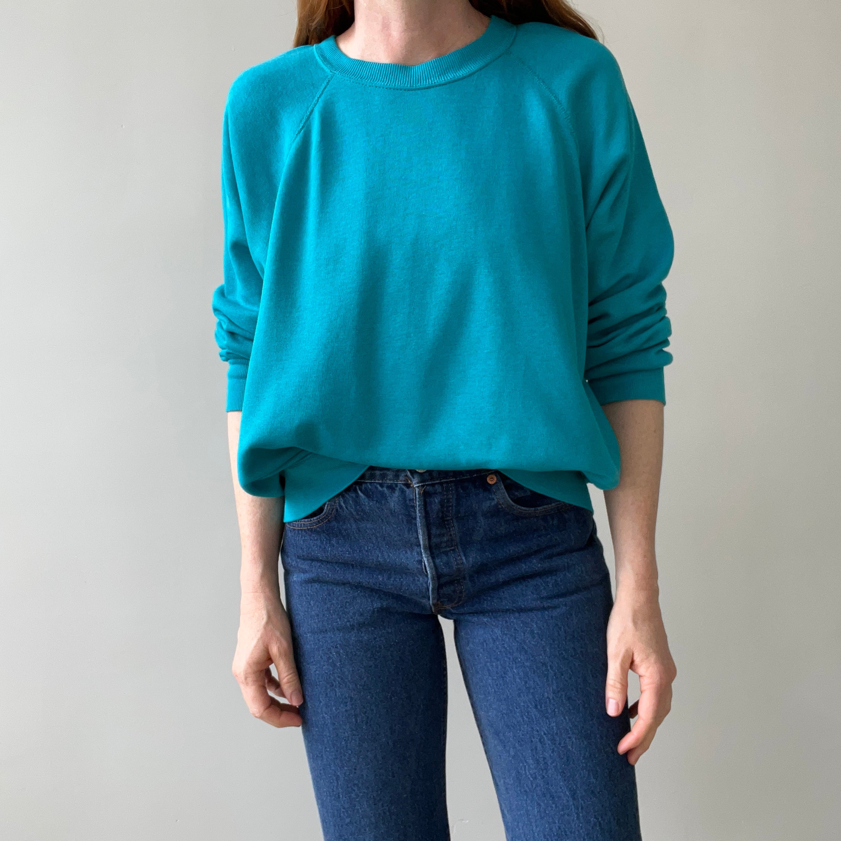 1980s Turquoise Super Thinned Out and Slouchy Blank Raglan by Bassett Walker