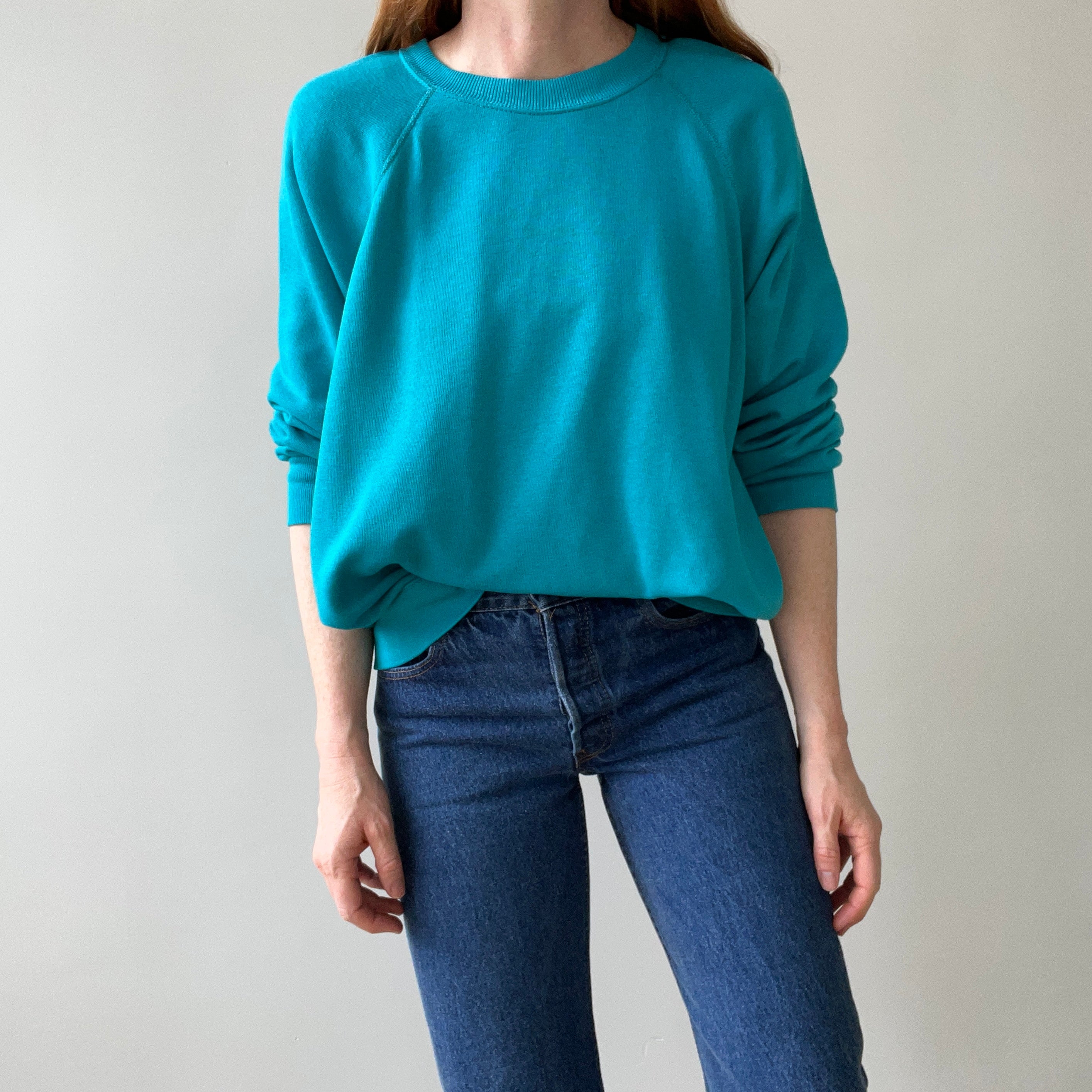 1980s Turquoise Super Thinned Out and Slouchy Blank Raglan by Bassett Walker