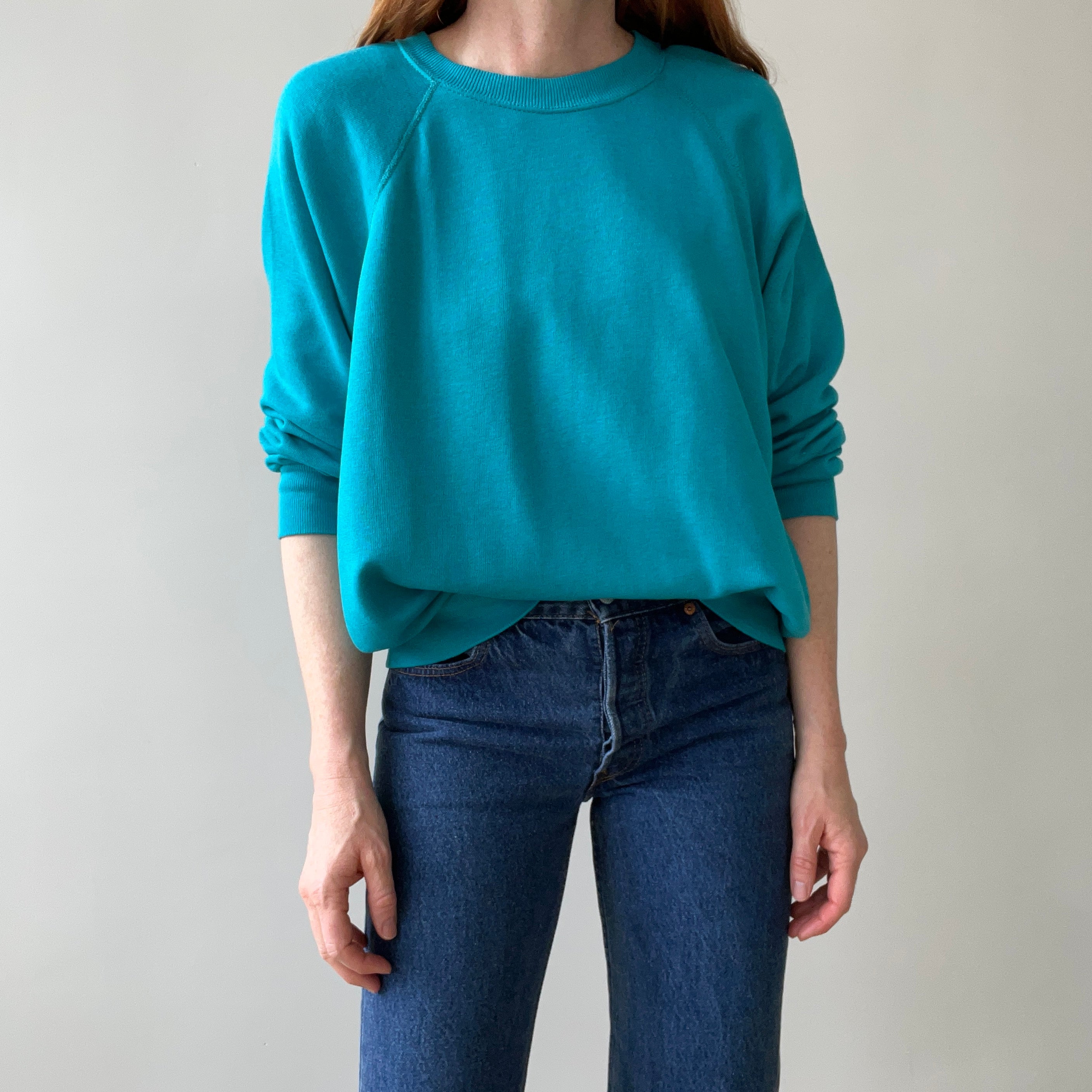 1980s Turquoise Super Thinned Out and Slouchy Blank Raglan by Bassett Walker