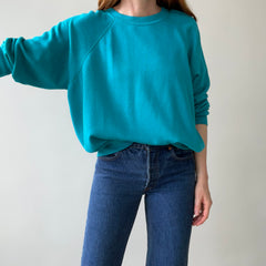 1980s Turquoise Super Thinned Out and Slouchy Blank Raglan by Bassett Walker