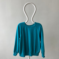 1980s Turquoise Super Thinned Out and Slouchy Blank Raglan by Bassett Walker