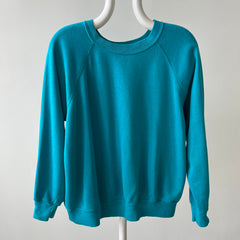 1980s Turquoise Super Thinned Out and Slouchy Blank Raglan by Bassett Walker