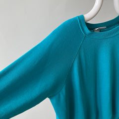 1980s Turquoise Super Thinned Out and Slouchy Blank Raglan by Bassett Walker