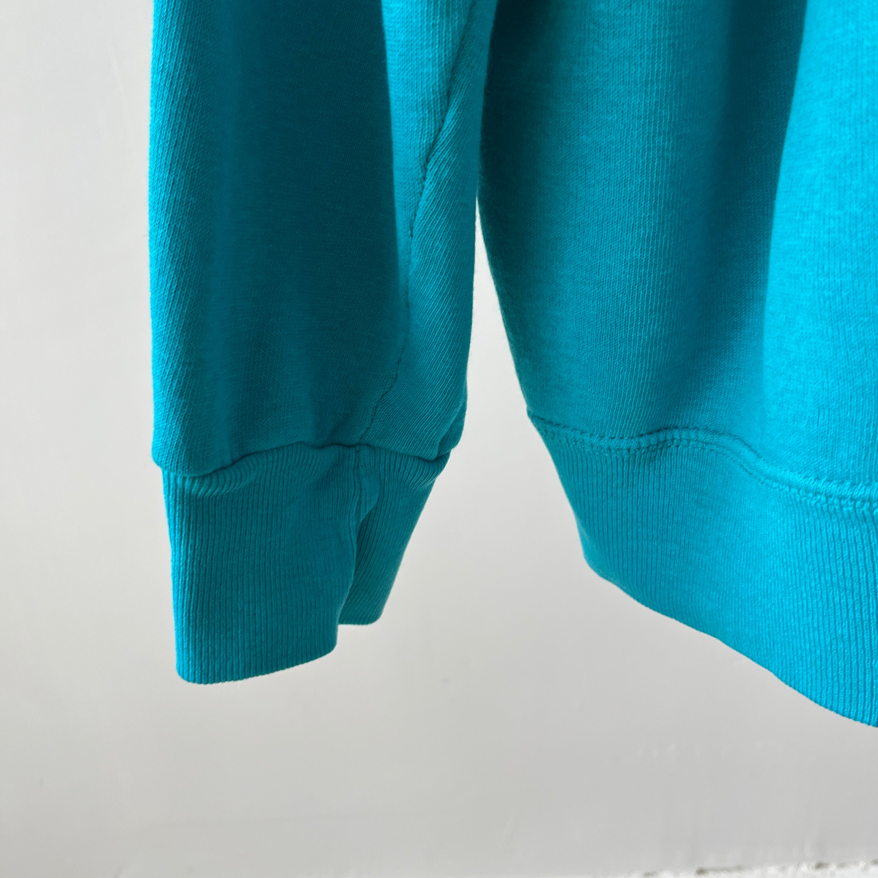 1980s Turquoise Super Thinned Out and Slouchy Blank Raglan by Bassett Walker