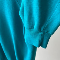 1980s Turquoise Super Thinned Out and Slouchy Blank Raglan by Bassett Walker