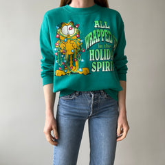 1980/90s All Wrapped Up in the Holiday Spirit - Garfield Sweatshirt - Staining