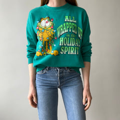 1980/90s All Wrapped Up in the Holiday Spirit - Garfield Sweatshirt - Staining