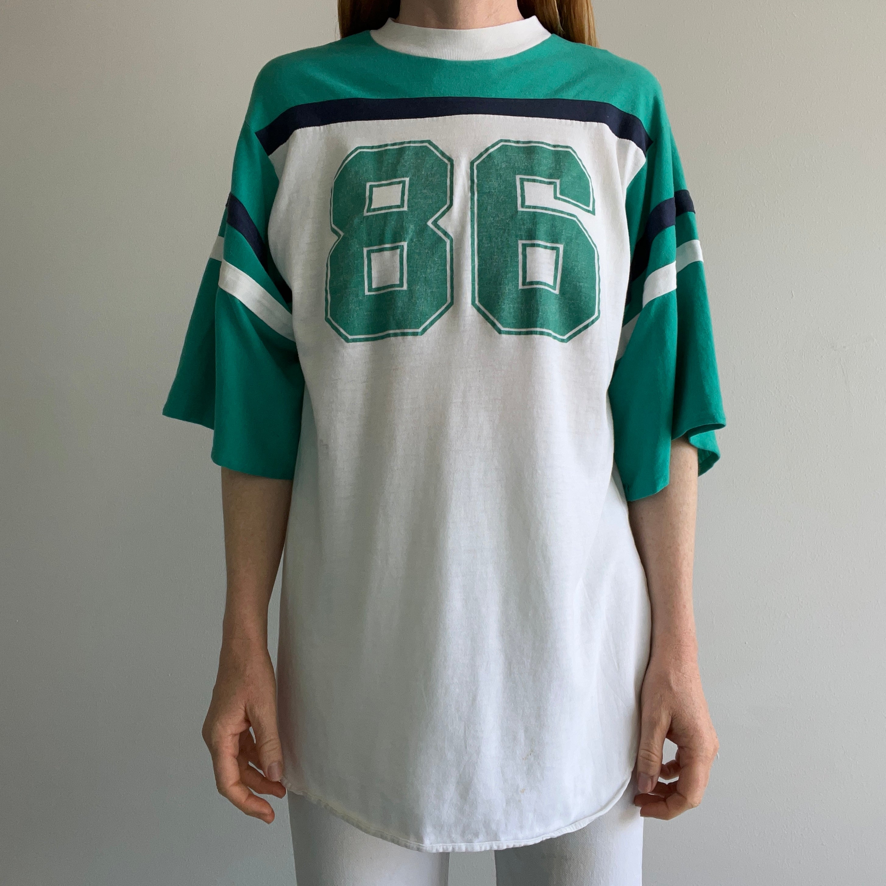 1986 Very Slouchy and Thin Football T-Shirt with XL Sleeves