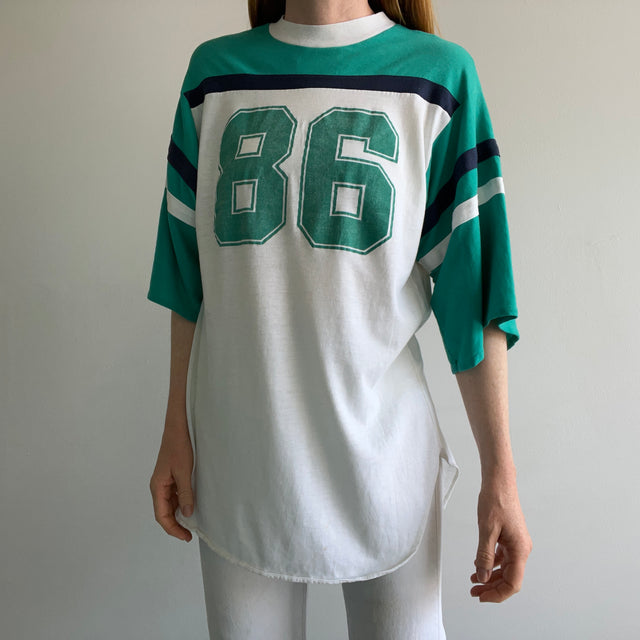 1986 Very Slouchy and Thin Football T-Shirt with XL Sleeves