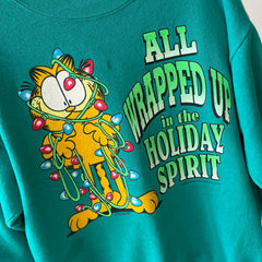 1980/90s All Wrapped Up in the Holiday Spirit - Garfield Sweatshirt - Staining