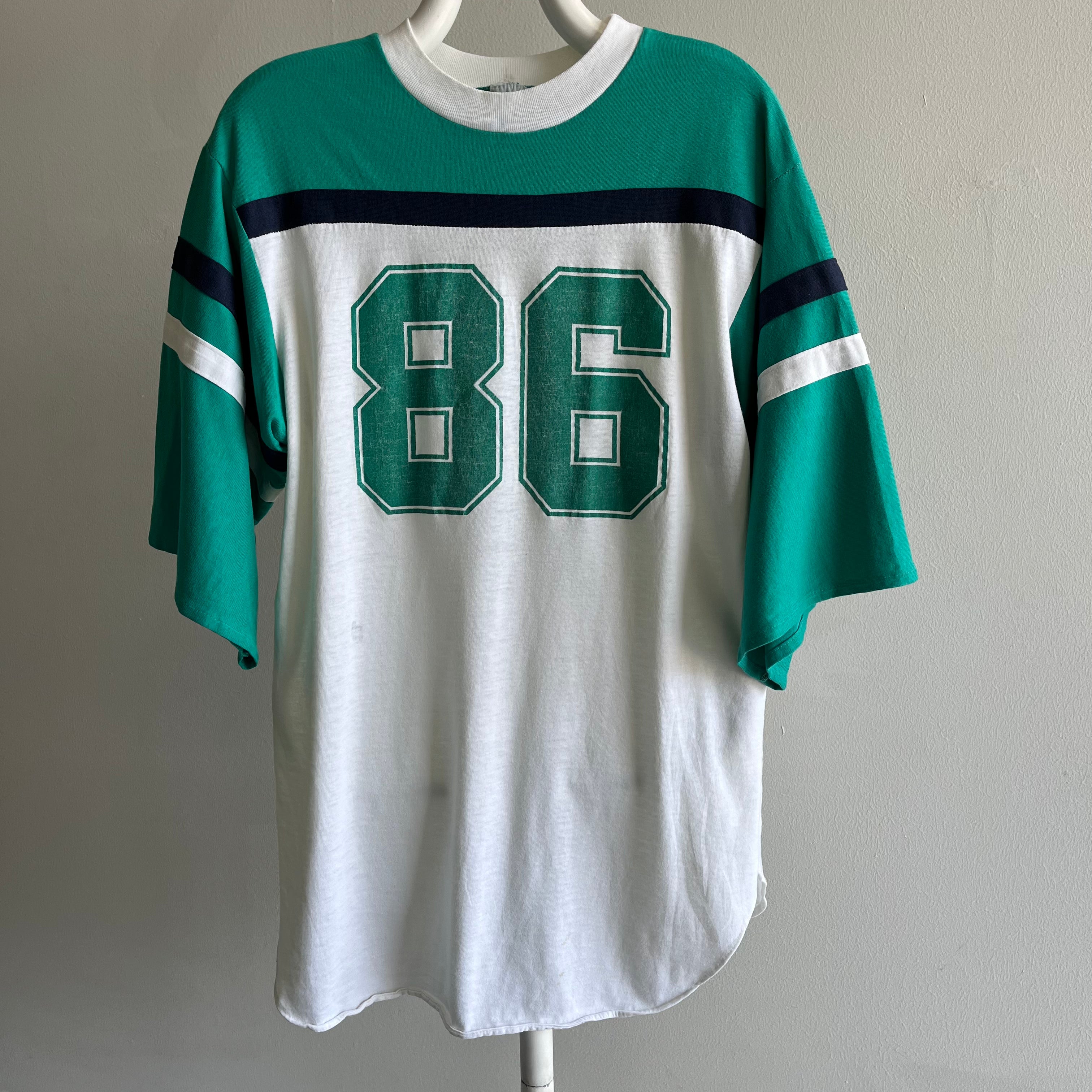 1986 Very Slouchy and Thin Football T-Shirt with XL Sleeves