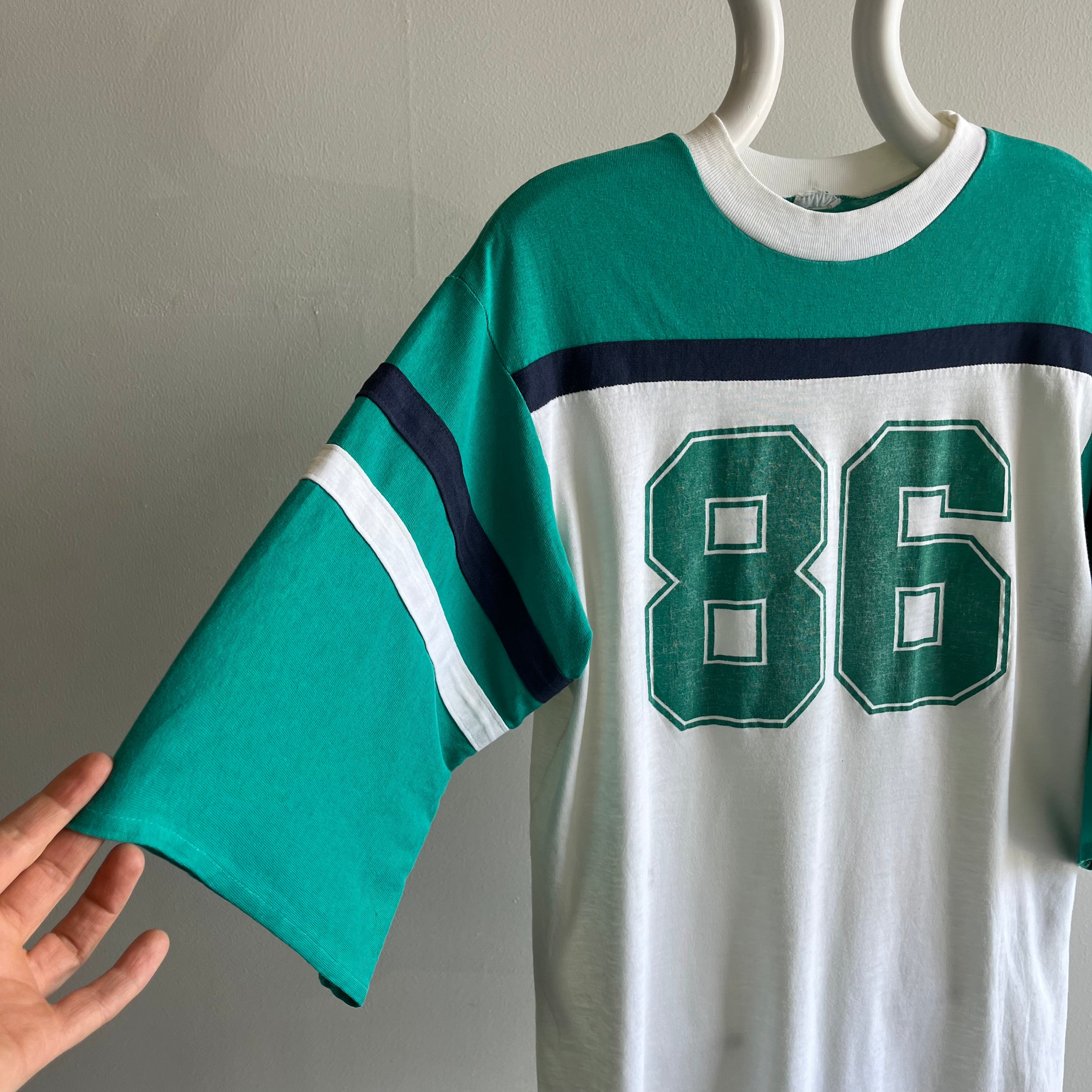 1986 Very Slouchy and Thin Football T-Shirt with XL Sleeves