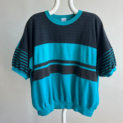 1980s Teal and Black Warm Up