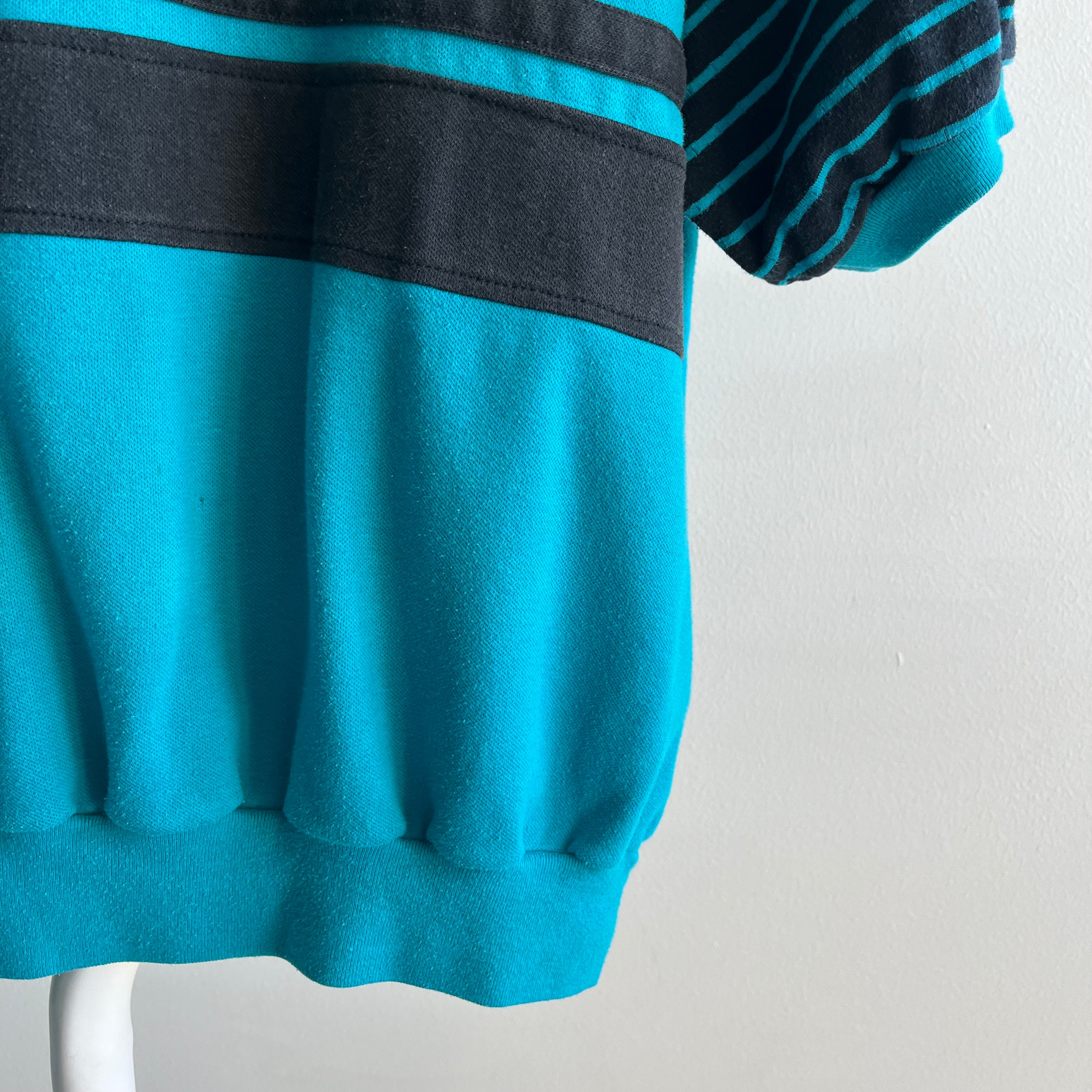 1980s Teal and Black Warm Up