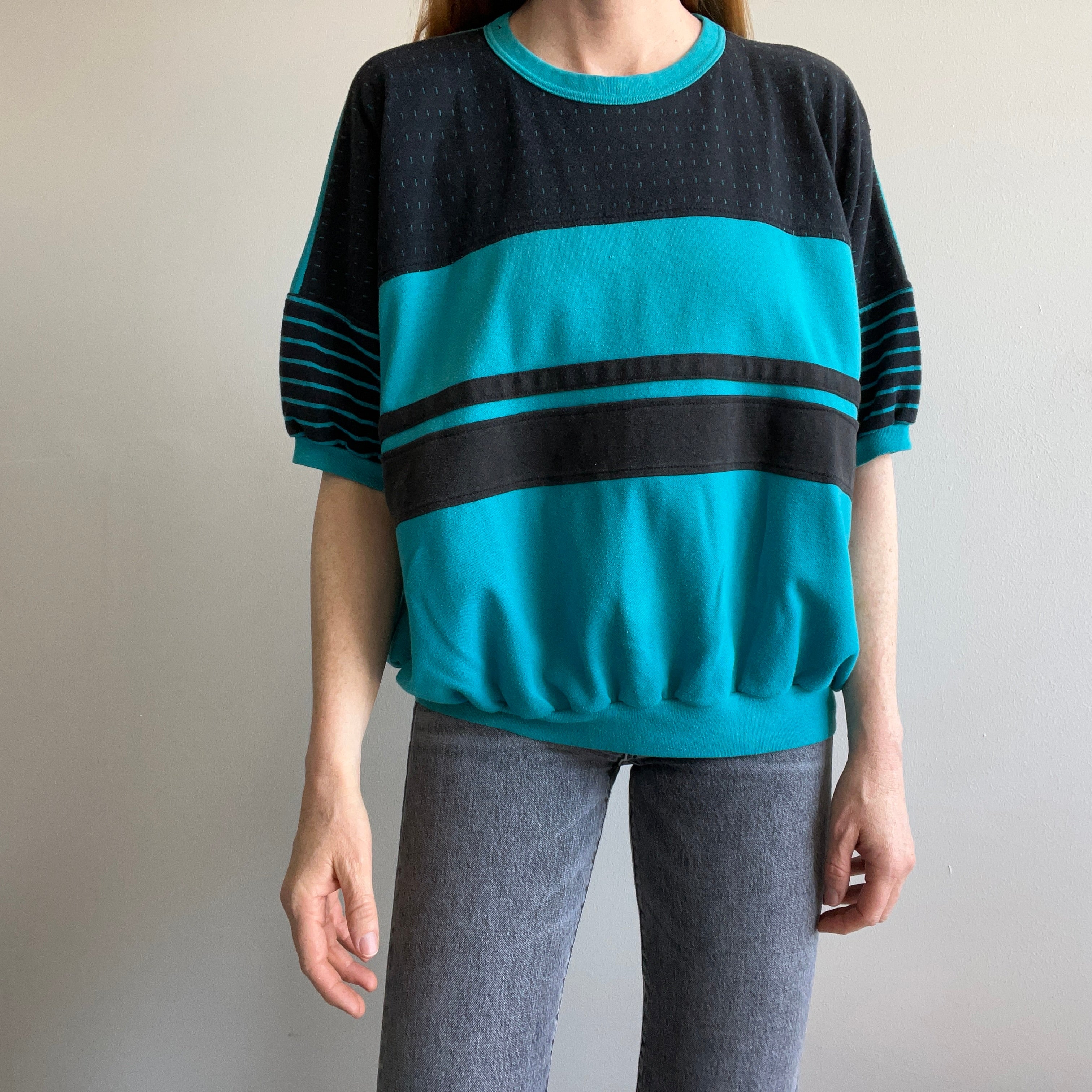 1980s Teal and Black Warm Up