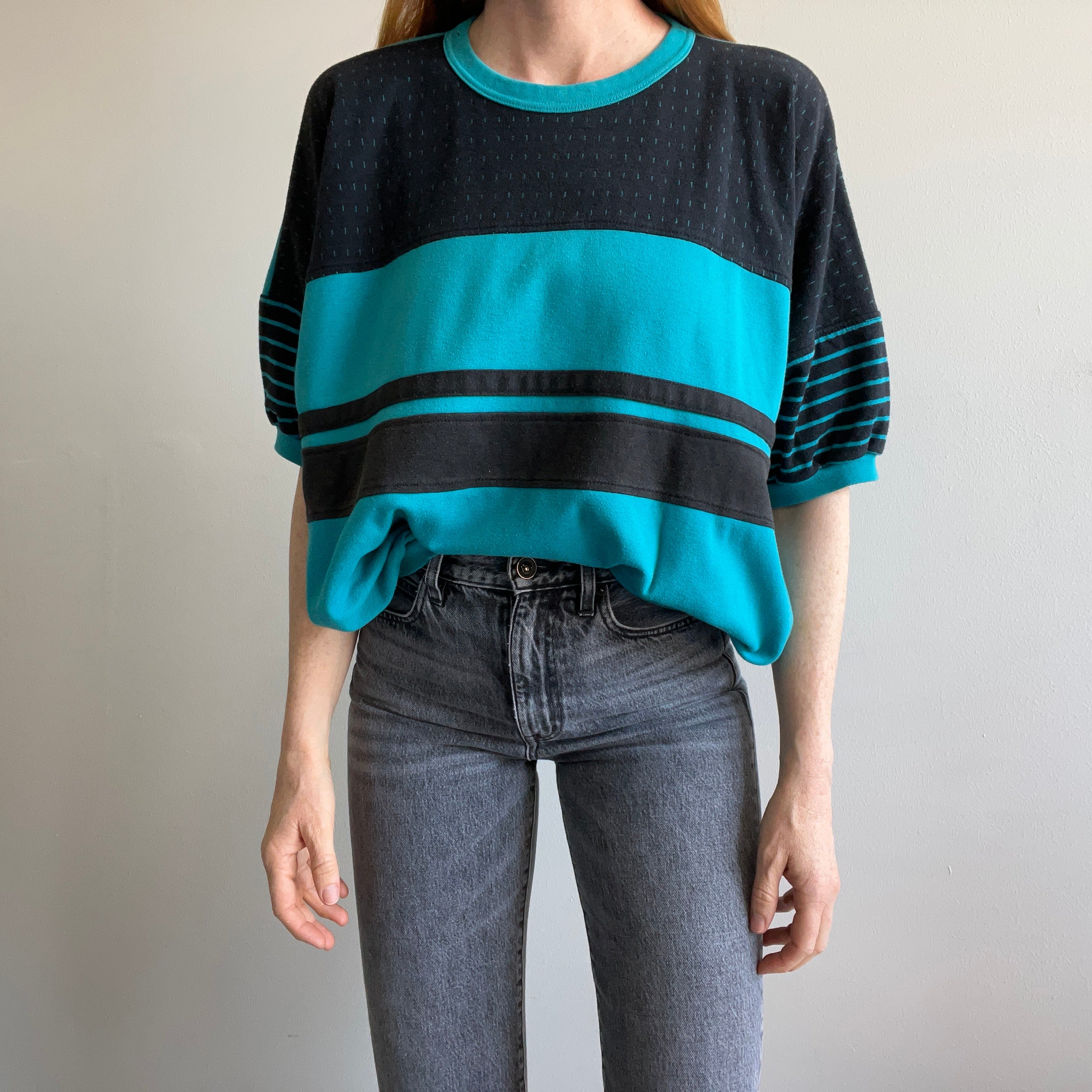 1980s Teal and Black Warm Up