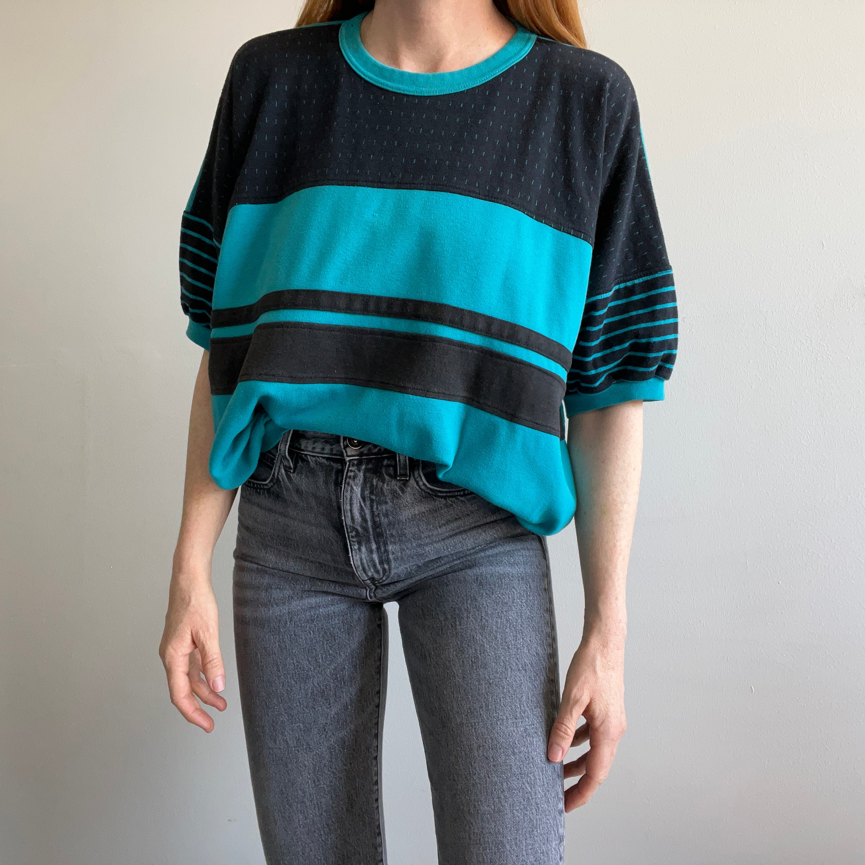 1980s Teal and Black Warm Up