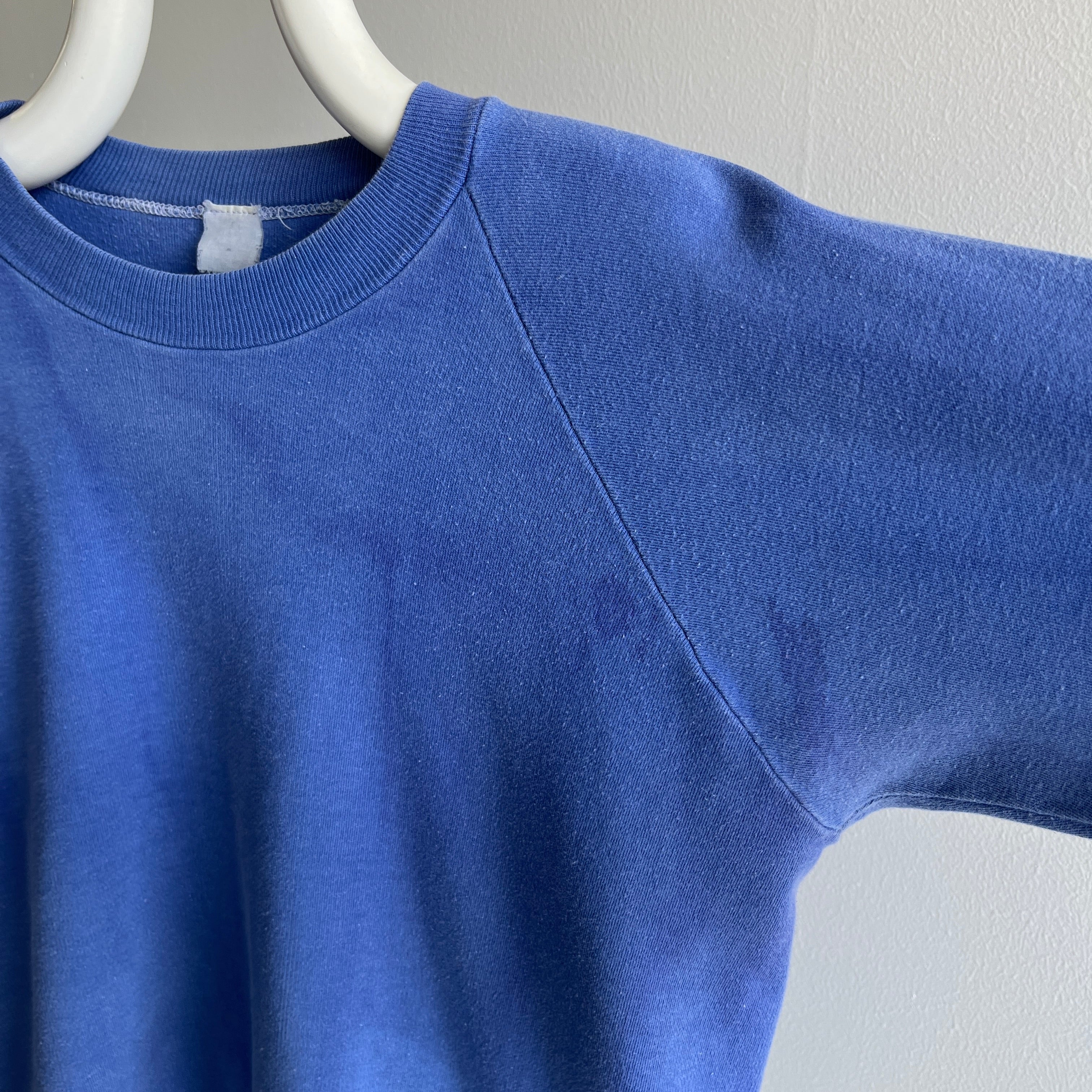 1970s Incredible Shorter Long Sleeve Bleach and Sun Faded Periwinkle Sweatshirt