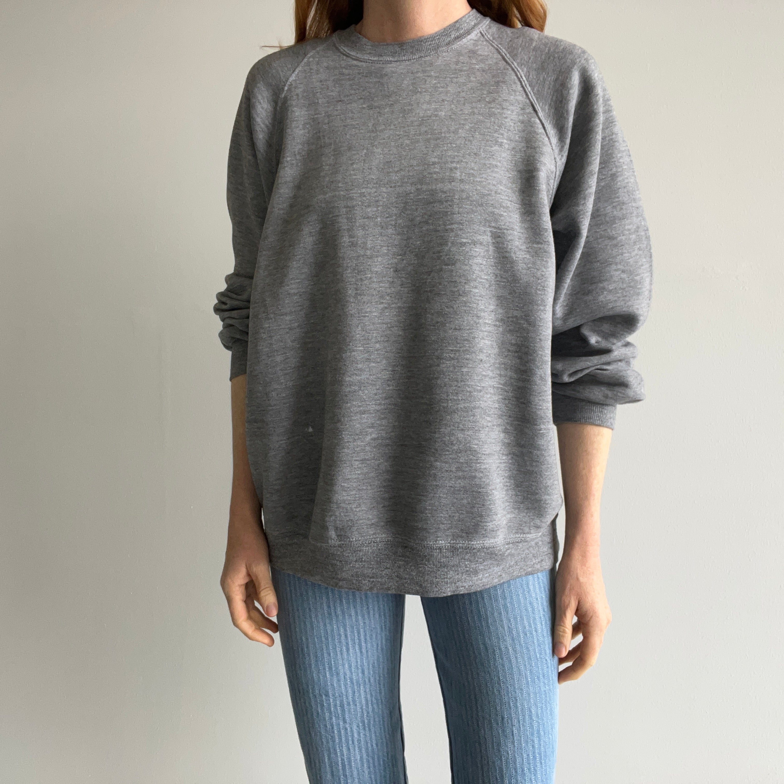 1980s Jerzees by Russell Perfectly 80s Gray Raglan Sweatshirt with a Single Bleach Stain