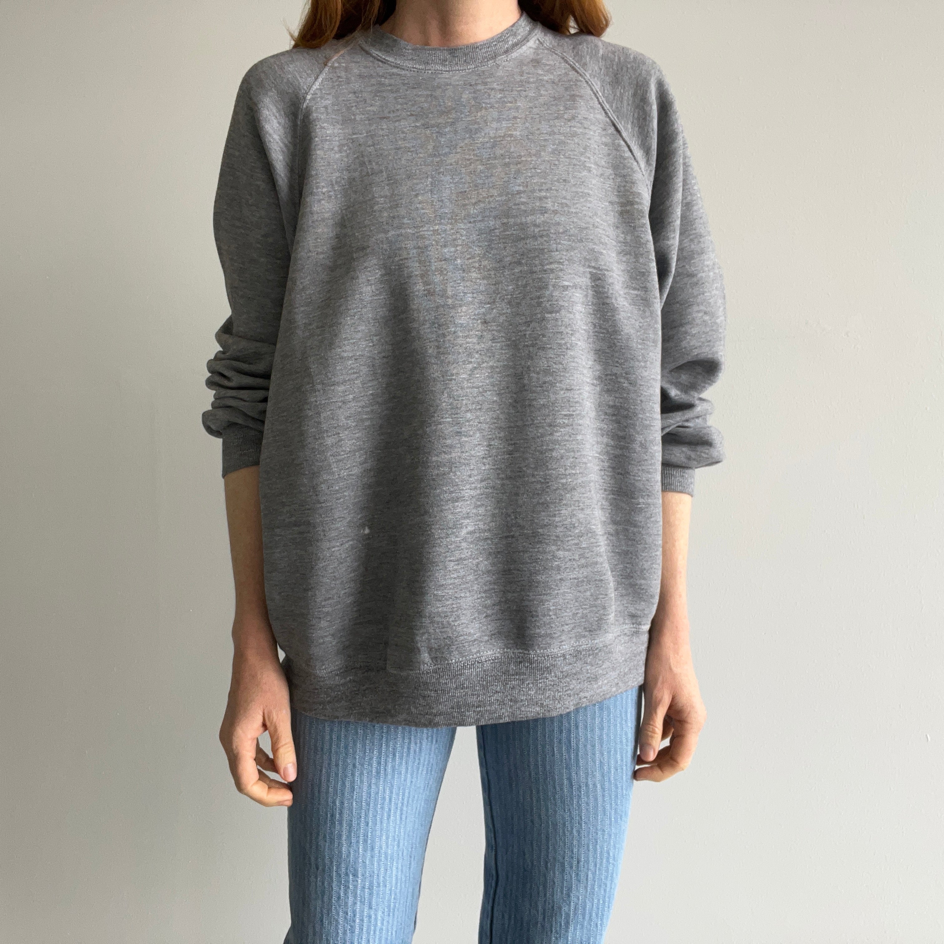 1980s Jerzees by Russell Perfectly 80s Gray Raglan Sweatshirt with a Single Bleach Stain