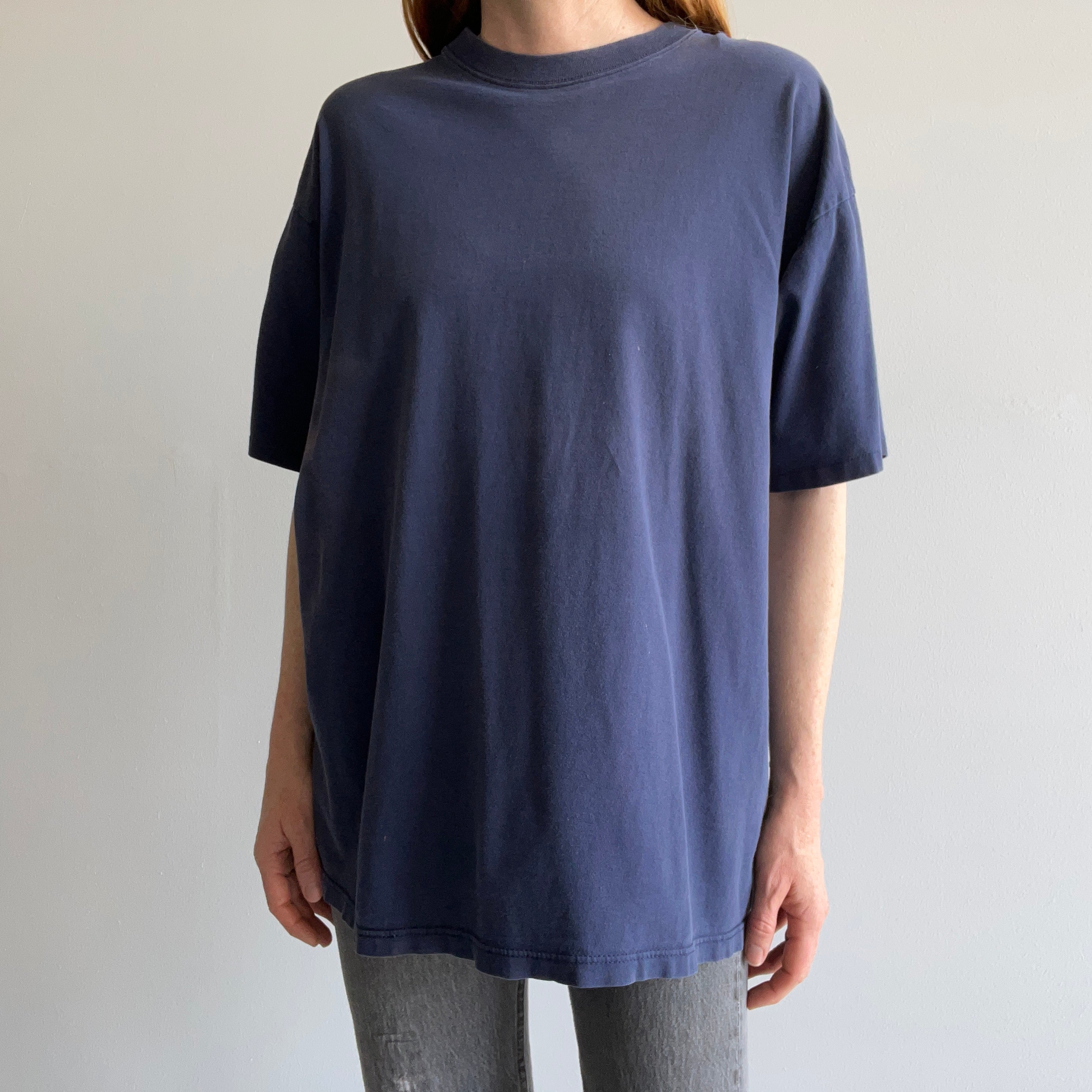 1980s Faded Navy Cotton T-Shirt with Some Graphic Fade on the Backside