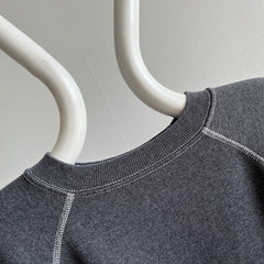 1980s Re Dyded Deep Gray Hanes Her Way Raglan Sweatshirt with White Contrast Stitching.