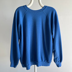 1980s Thinned Out and Slouchy Blue Raglan Sweatshirt