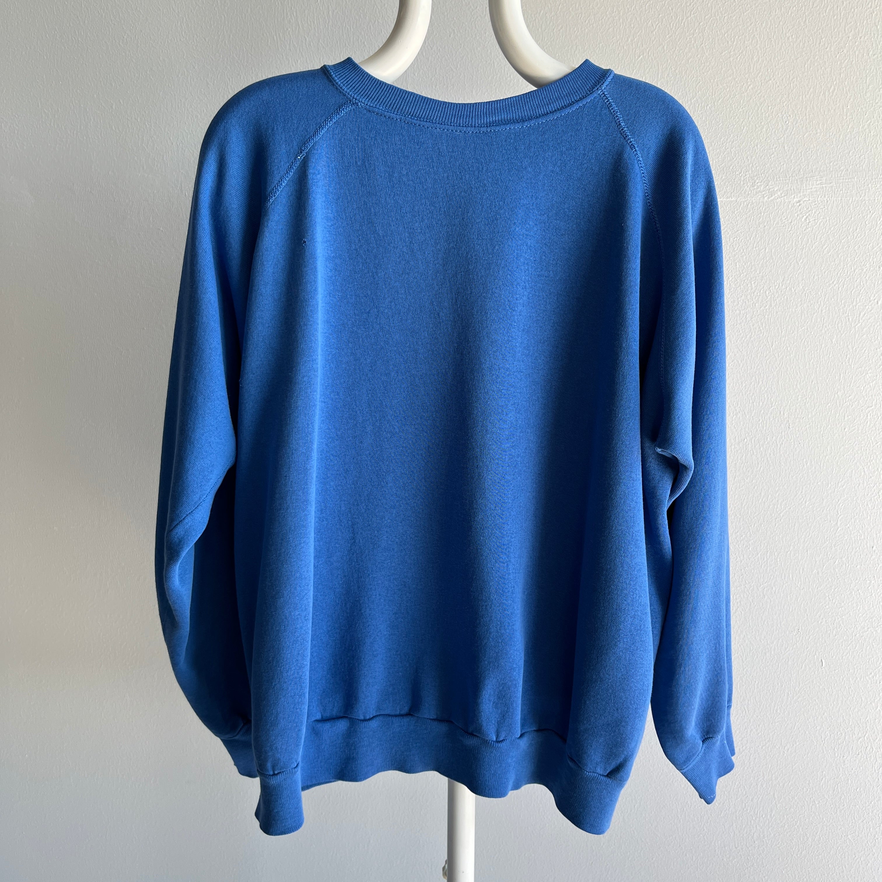 1980s Thinned Out and Slouchy Blue Raglan Sweatshirt