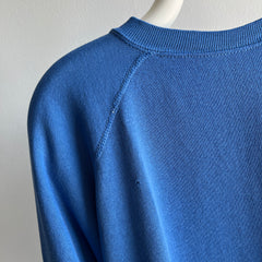 1980s Thinned Out and Slouchy Blue Raglan Sweatshirt