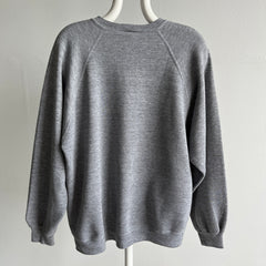 1980s Jerzees by Russell Perfectly 80s Gray Raglan Sweatshirt with a Single Bleach Stain