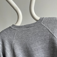 1980s Jerzees by Russell Perfectly 80s Gray Raglan Sweatshirt with a Single Bleach Stain