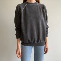 1980s Re Dyded Deep Gray Hanes Her Way Raglan Sweatshirt with White Contrast Stitching.