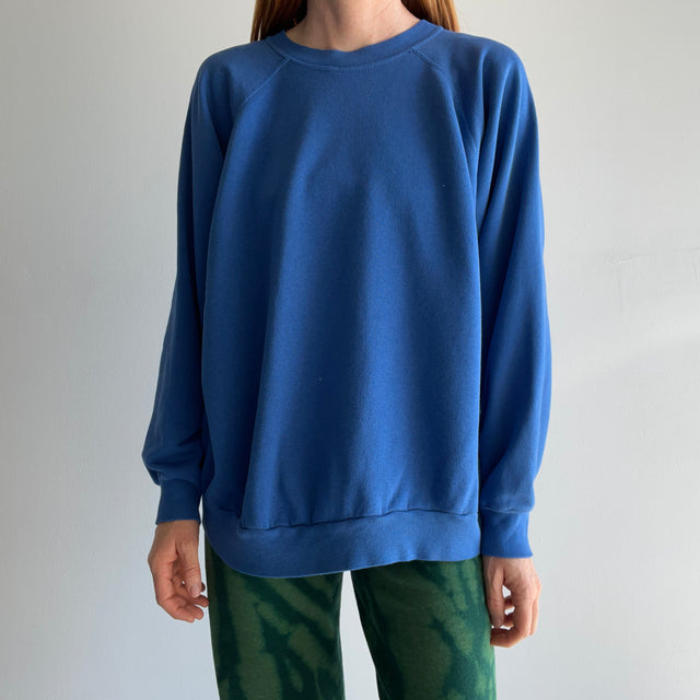 1980s Thinned Out and Slouchy Blue Raglan Sweatshirt