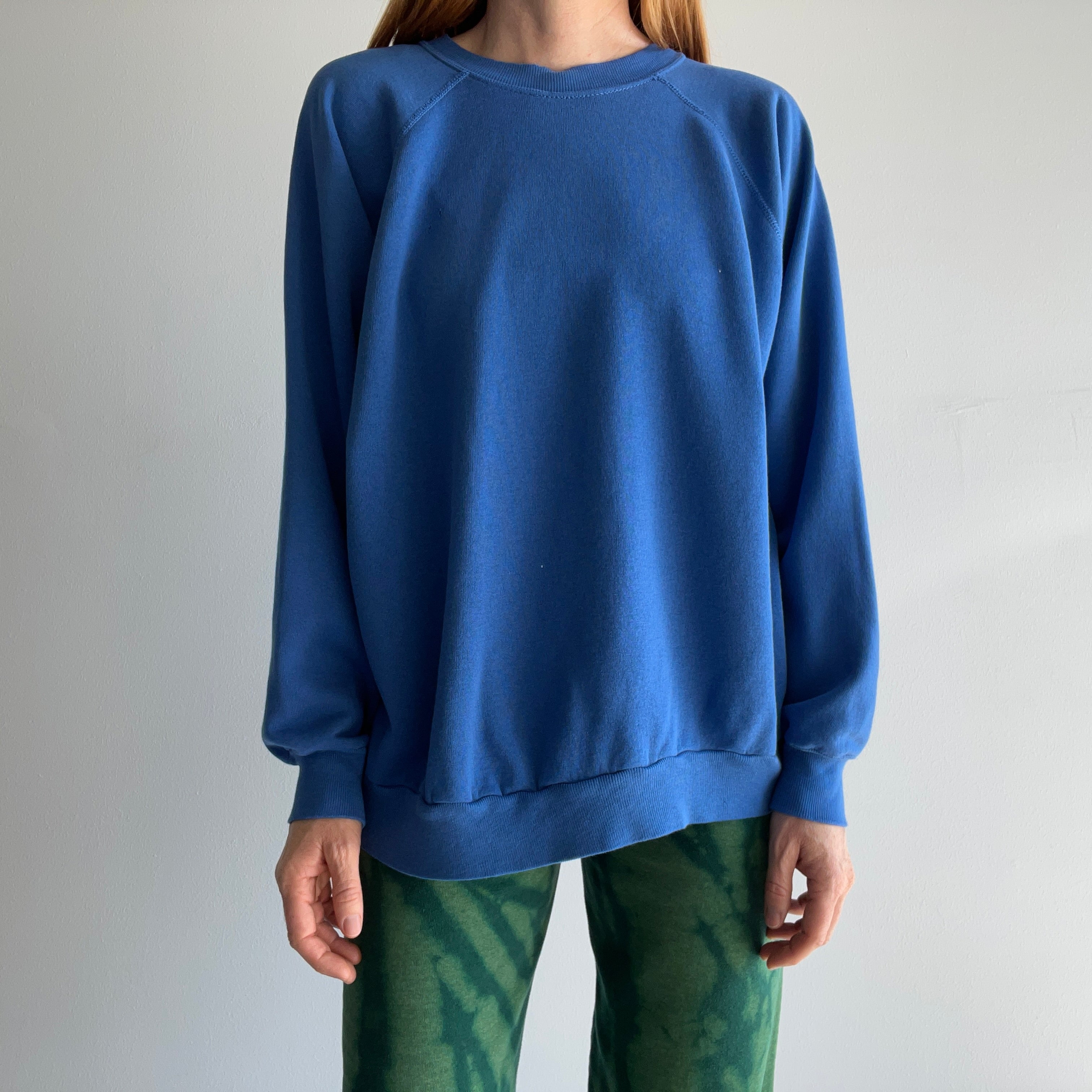 1980s Thinned Out and Slouchy Blue Raglan Sweatshirt